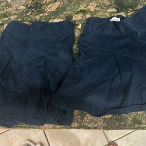 2 blue girls Cat and Jack uniform skorts